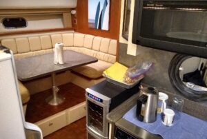 View of the dinette showing part of the galley in foreground.