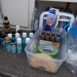 Paint and tools assembled to start painting.