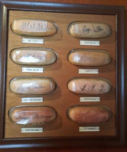 Framed signed hot dog buns hanging at Tony Packo's.